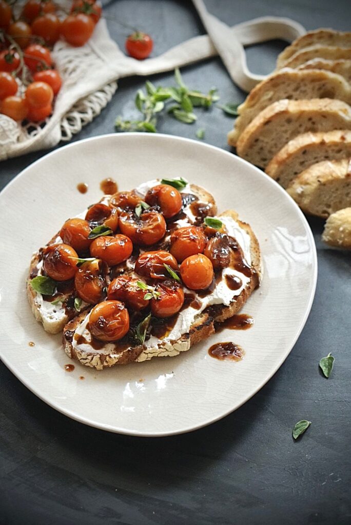 Balsamic tomato ricotta toast with fresh oregano