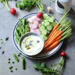 Colorful vegetable platter served with creamy avocado Greek yogurt dip made with fresh avocado and Greek yogurt.