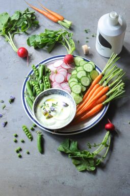 Colorful vegetable platter served with creamy avocado Greek yogurt dip made with fresh avocado and Greek yogurt.