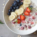 Overnight oats with almond milk, banana, strawberries, and blueberries
