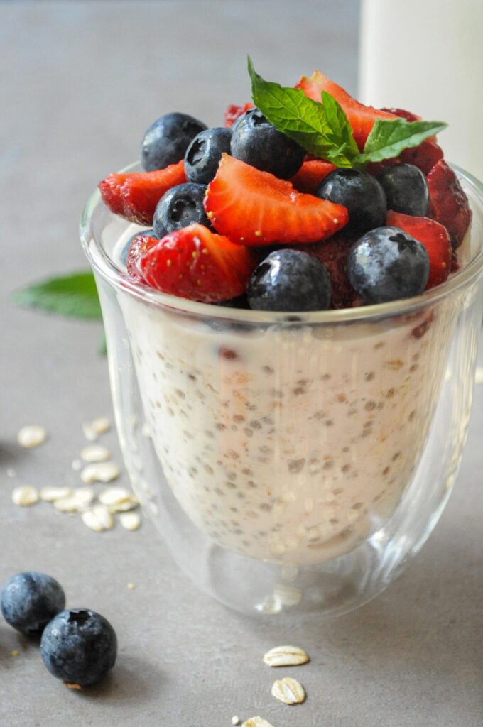 Almond milk overnight oats with chia seeds, strawberries, and blueberries