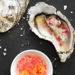 Fresh oyster served with red onion mignonette sauce