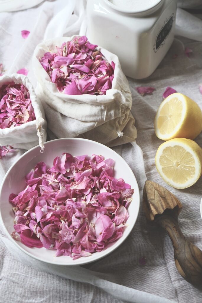 Fresh edible pink rose petals and lemons for easy homemade rose petal jam
